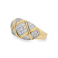 A two-tone diamond ring with a gold and silver pavé design, shown on a clean white background.