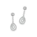 A pair of white gold drop earrings with round cluster studs, small round links, and teardrop-shaped drops set with diamonds. 