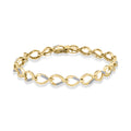A yellow gold infinity link bracelet with small diamonds on alternating links, displayed on a clean white background.