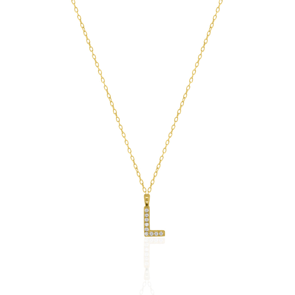 A goldtone initial necklace featuring a  letter pendant set with small clear stones, suspended from a delicate gold chain against a white background.