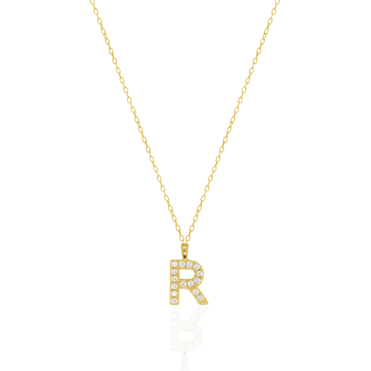 A goldtone initial necklace featuring a  letter pendant set with small clear stones, suspended from a delicate gold chain against a white background.