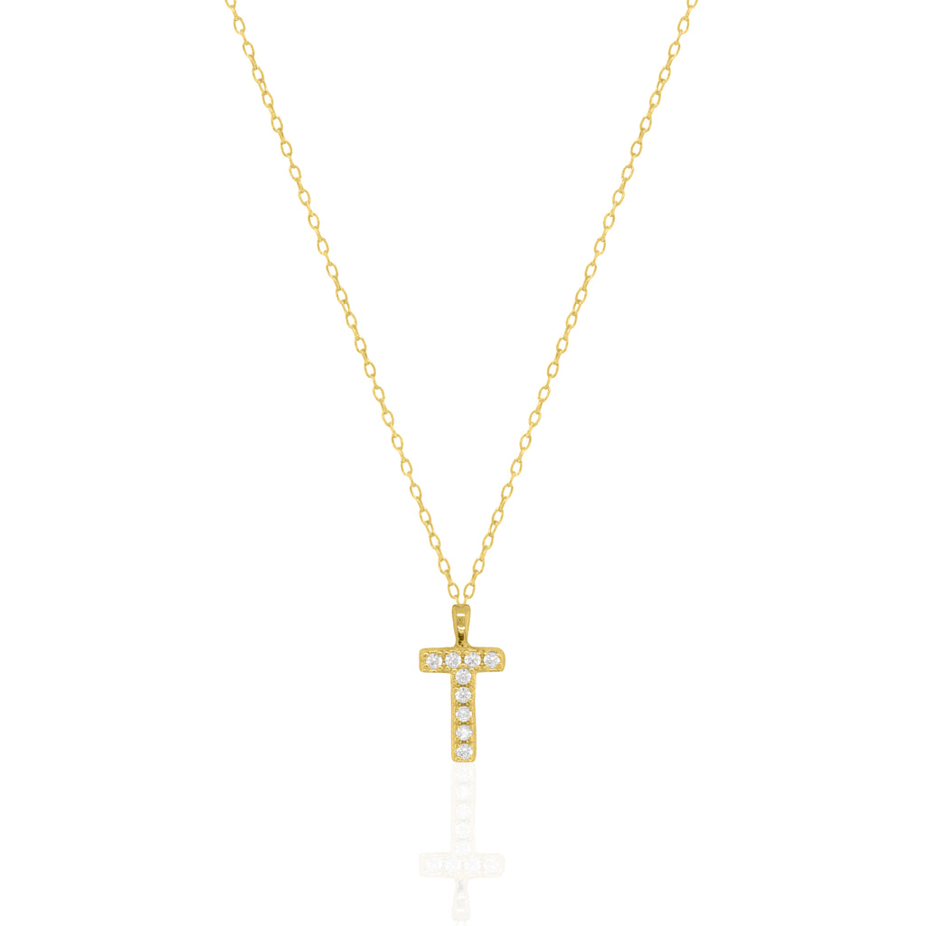 A goldtone initial necklace featuring a  letter pendant set with small clear stones, suspended from a delicate gold chain against a white background.