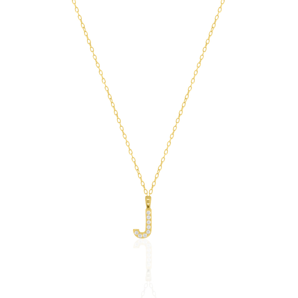 A goldtone initial necklace featuring a  letter pendant set with small clear stones, suspended from a delicate gold chain against a white background.