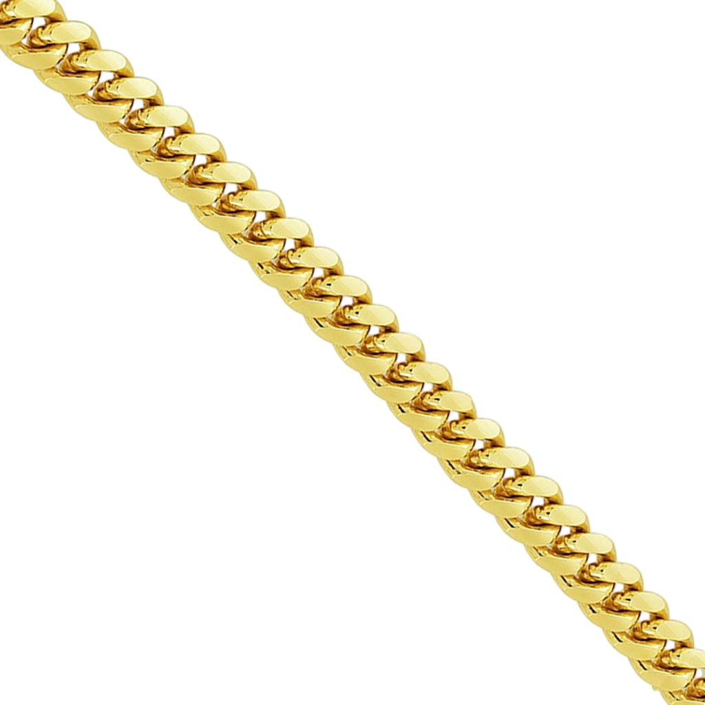 A close-up of a yellow gold cuban chain link against a plain white background.