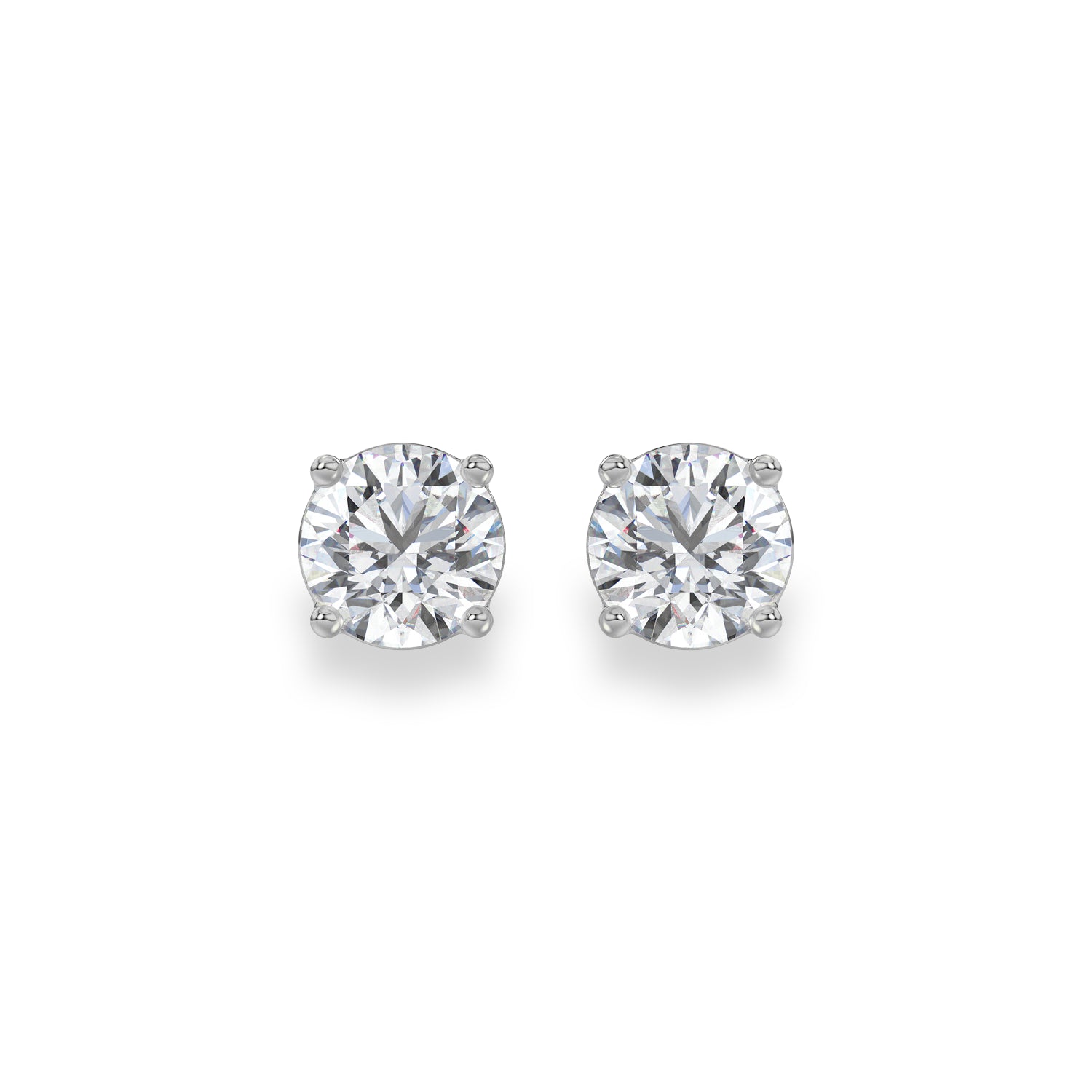 A pair of round-cut diamond stud earrings in a silver four-prong setting, displayed on a clean white background.