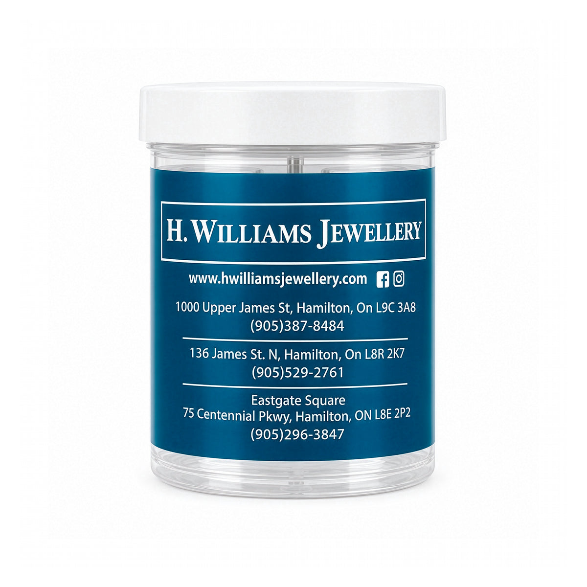 A clear cylindrical plastic jar with a white screw-top lid, featuring a blue label printed with the text 'H. WILLIAMS JEWELLERY' and contact details, on a white background.