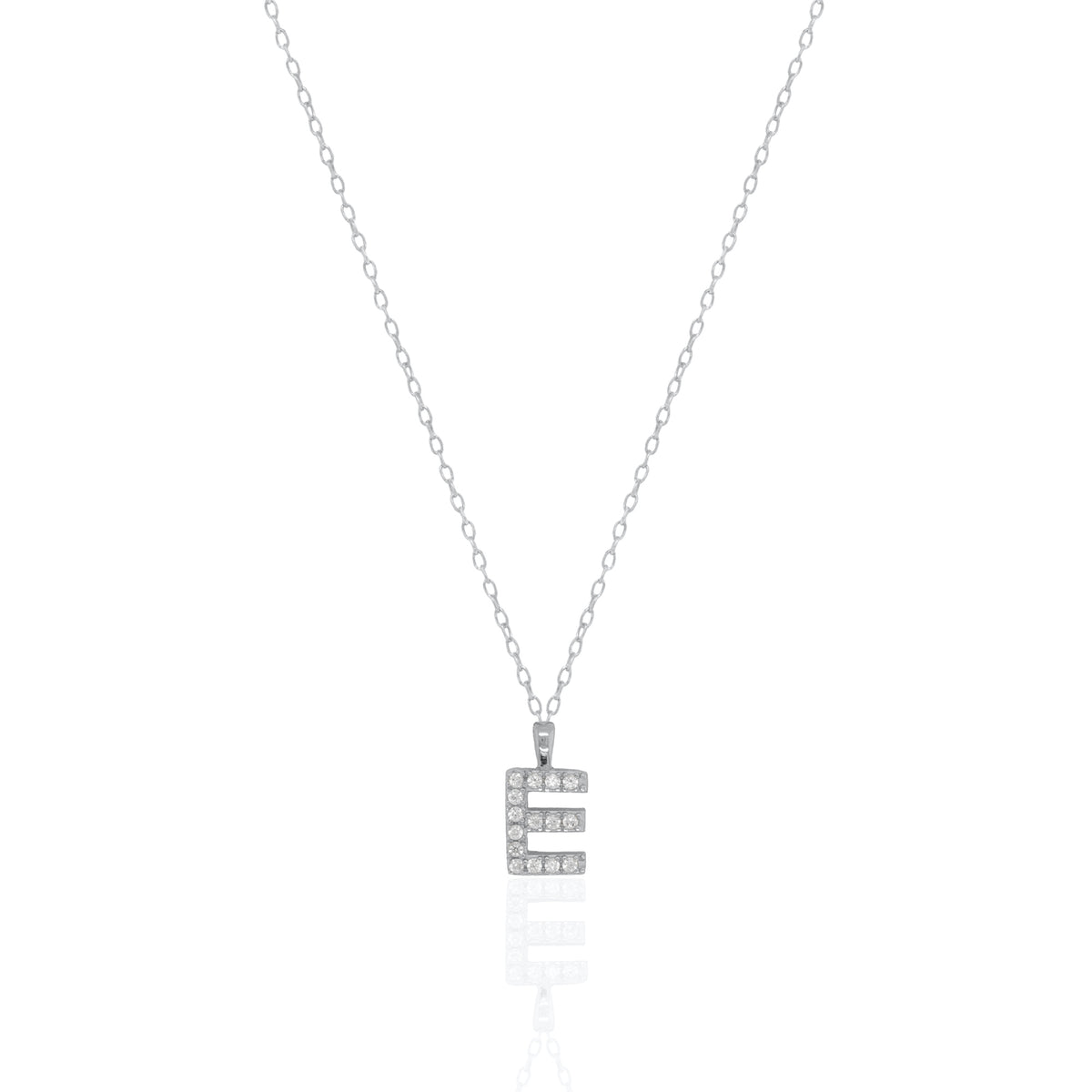 A silver initial necklace featuring a  letter pendant set with small clear stones, suspended from a delicate gold chain against a white background.