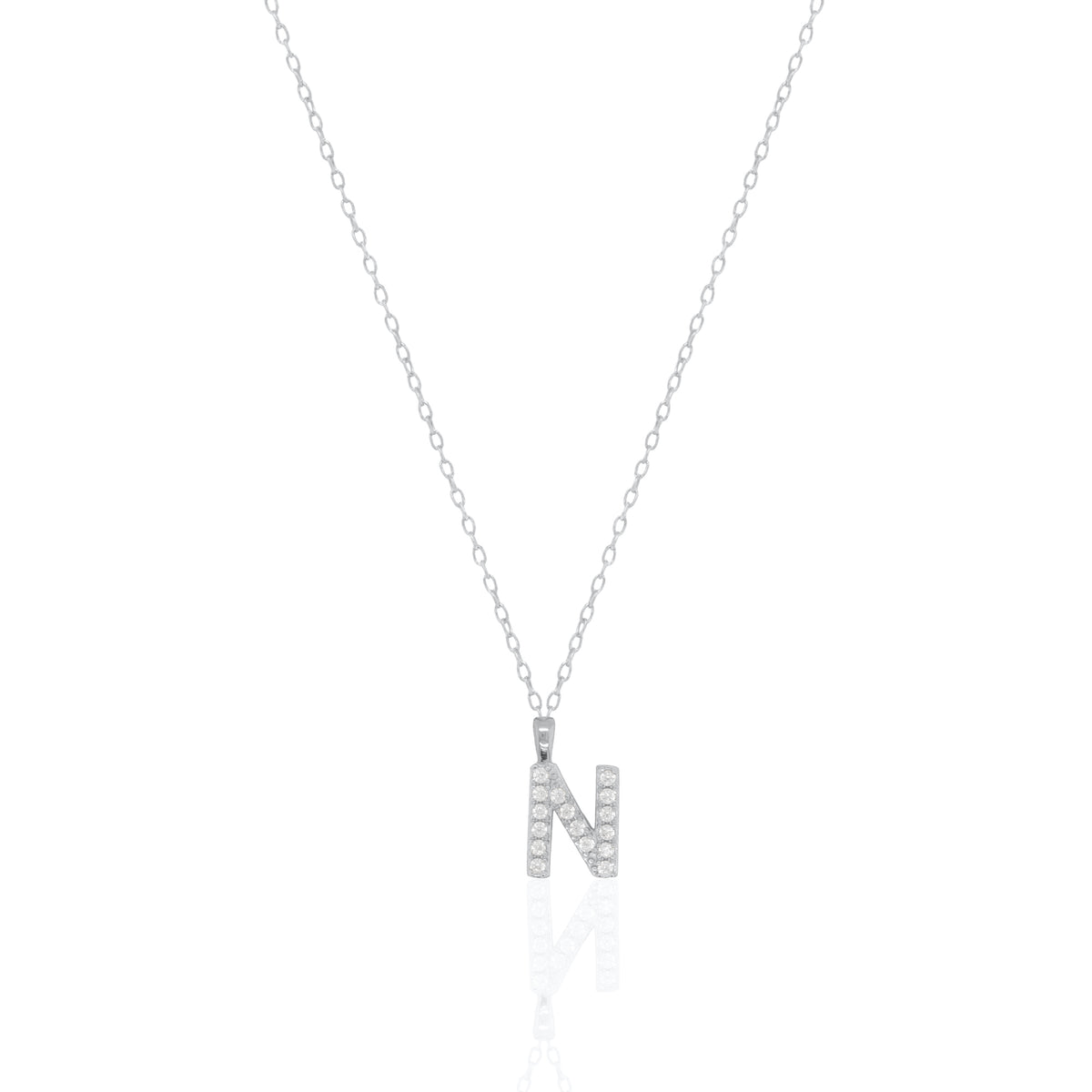 A silver initial necklace featuring a  letter pendant set with small clear stones, suspended from a delicate gold chain against a white background.