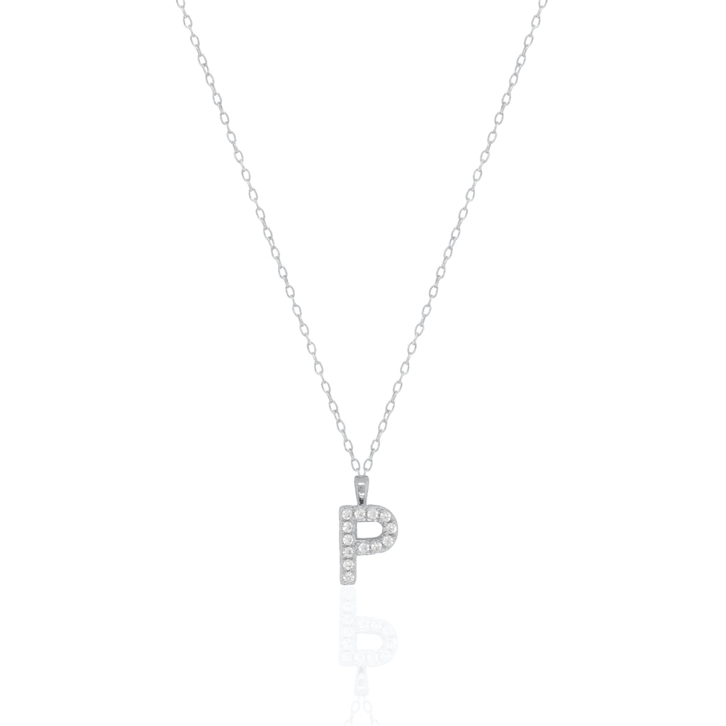 A silver initial necklace featuring a  letter pendant set with small clear stones, suspended from a delicate gold chain against a white background.