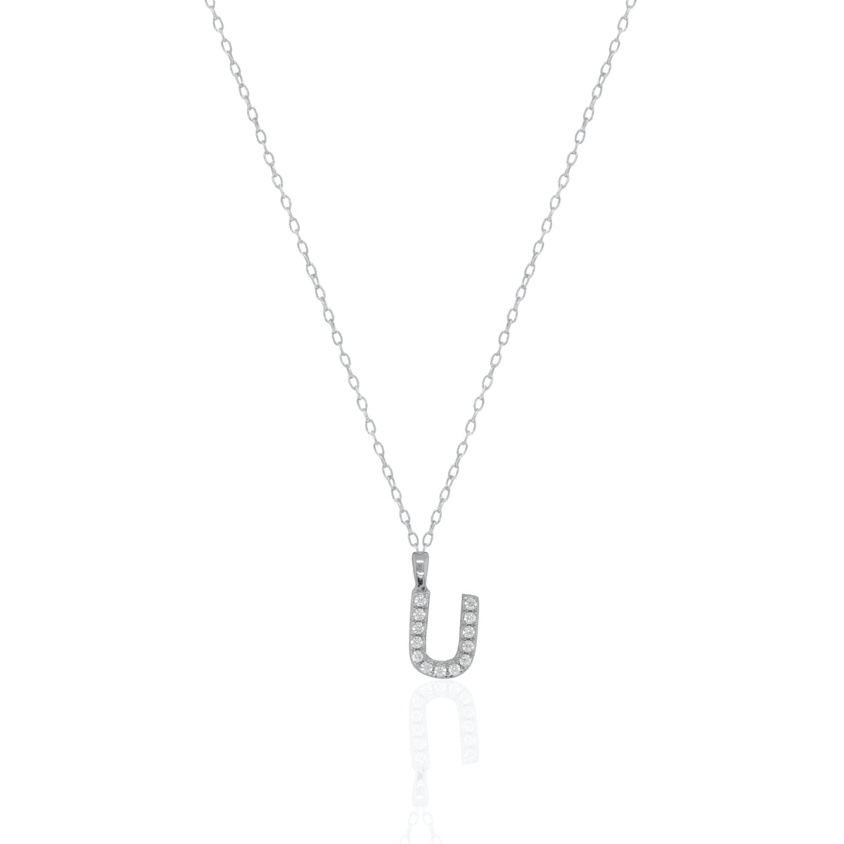 A silver initial necklace featuring a  letter pendant set with small clear stones, suspended from a delicate gold chain against a white background.