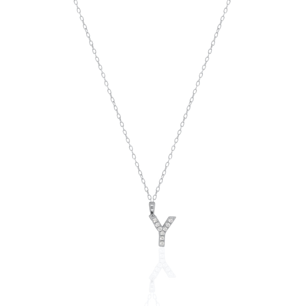 A silver initial necklace featuring a  letter pendant set with small clear stones, suspended from a delicate gold chain against a white background.
