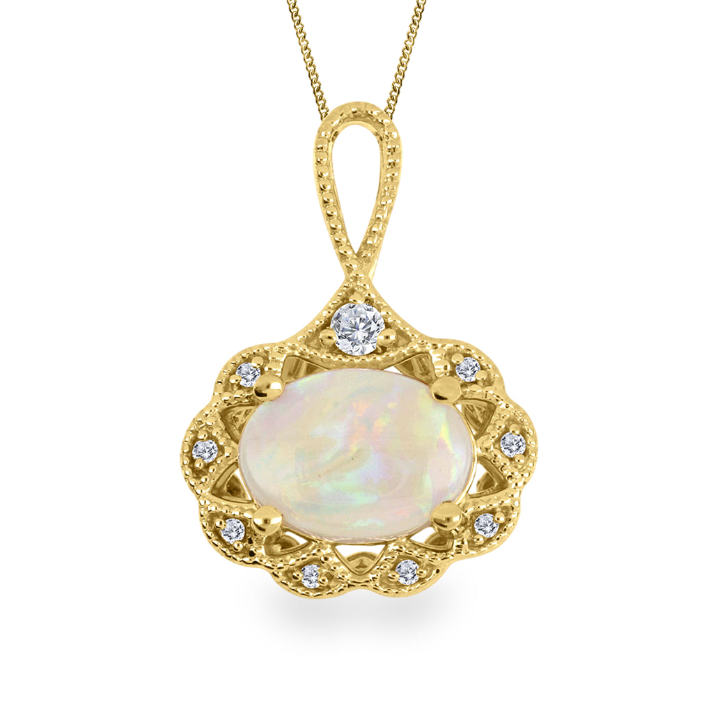 A yellow gold pendant necklace featuring an oval iridescent white opal center stone, surrounded by a scalloped gold frame set with small diamonds, suspended from a delicate gold chain against a white background.