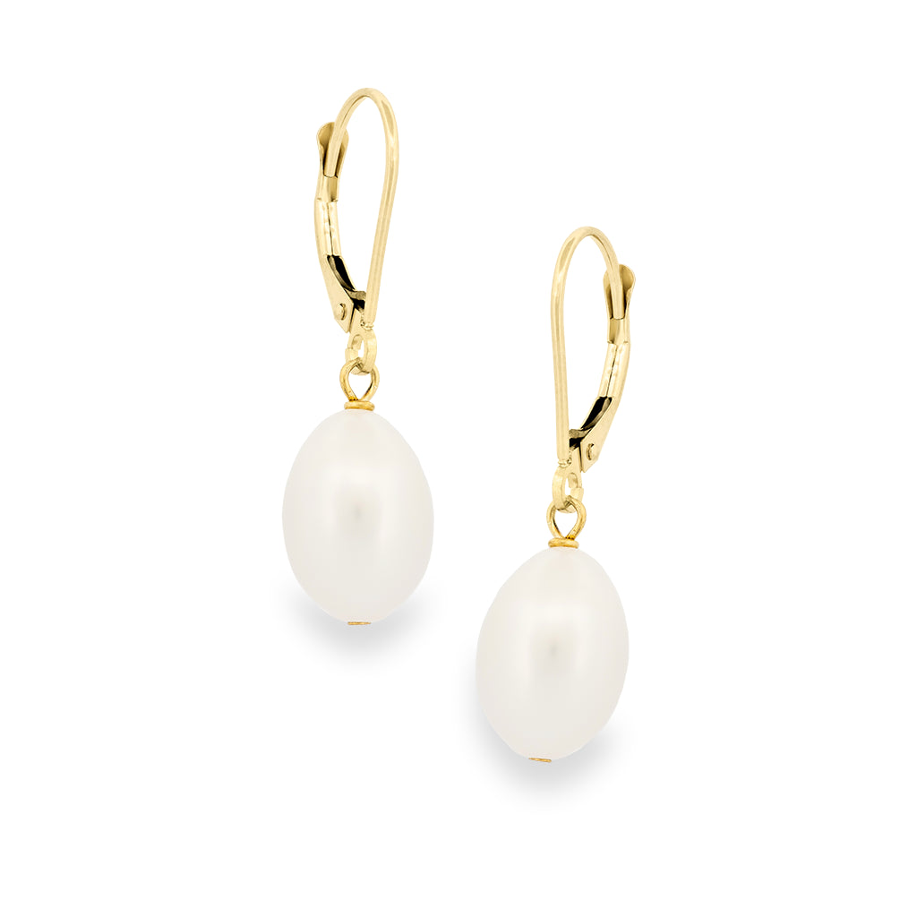 A pair of gold leverback drop earrings with oval white freshwater pearls, shown on a clean white background.