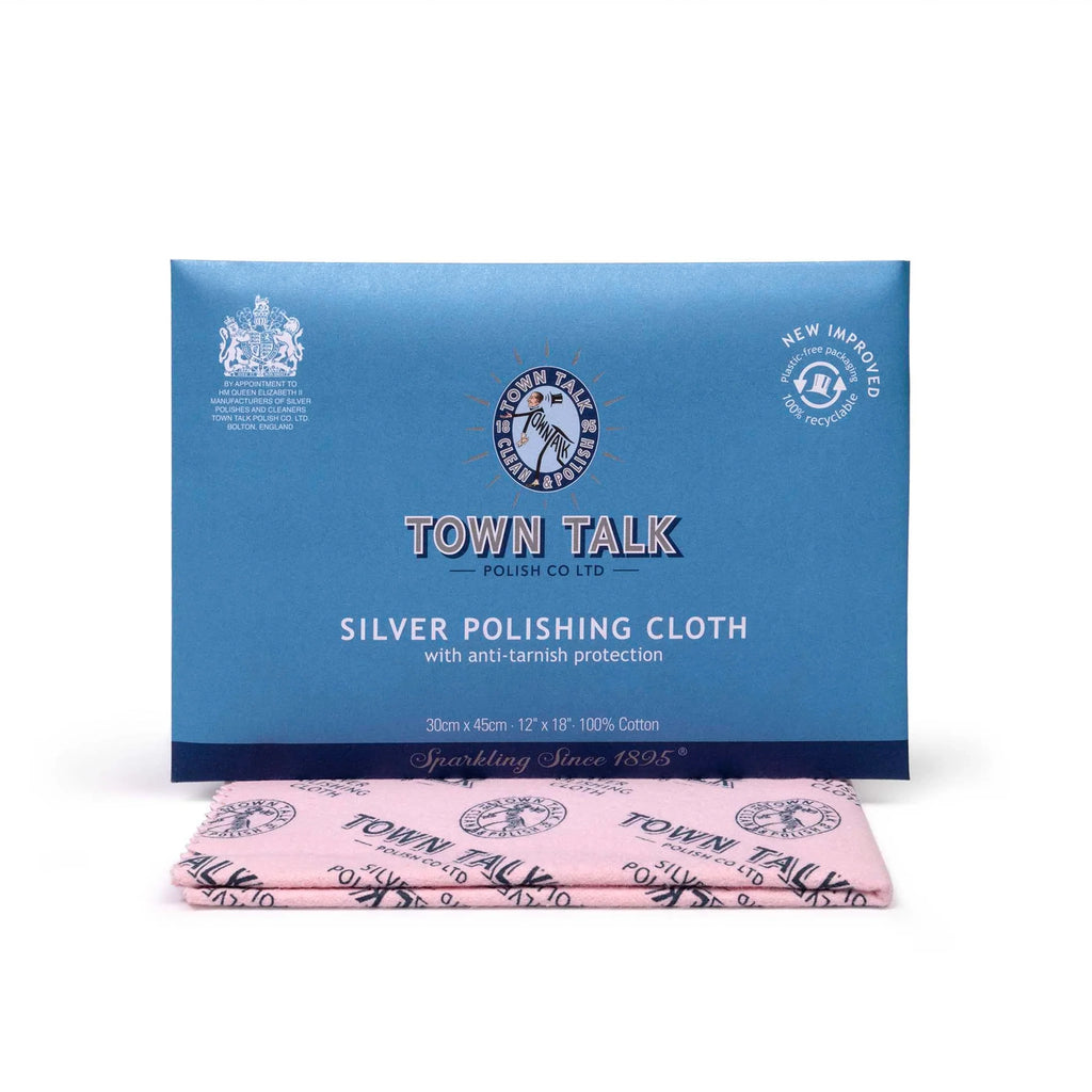 A box of Town Talk Silver Polishing Cloth with a folded pink cloth featuring black printed logos in front, on a white background.