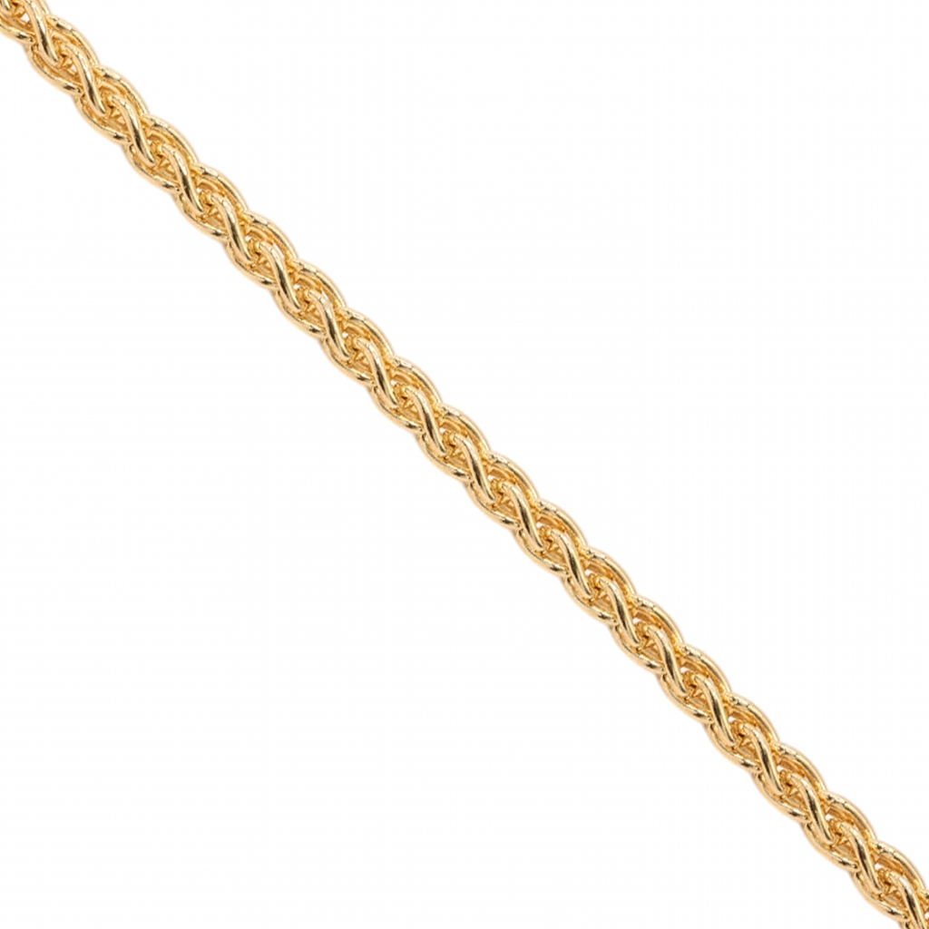 A close-up of a yellow gold wheat chain link against a plain white background.